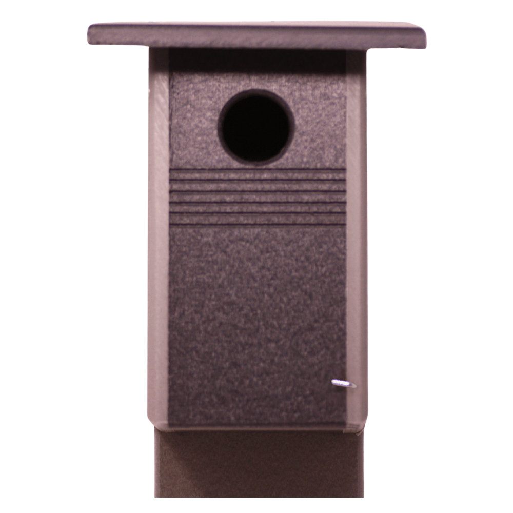 Brown birdhouse with a round entrance hole on a white background