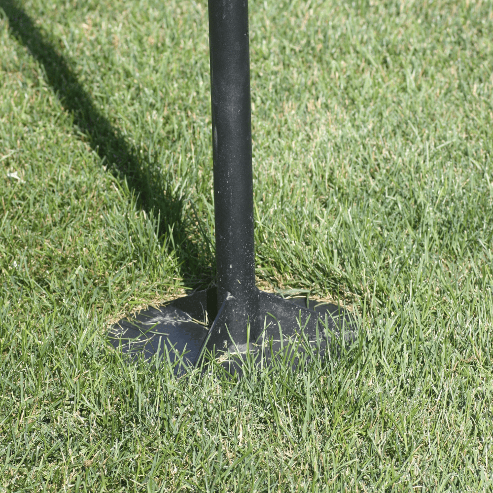 Decorative Multi-Feeder tree stake with base on grass