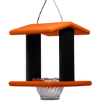 Hanging oriole bird feeder with orange top and black sides on a white background