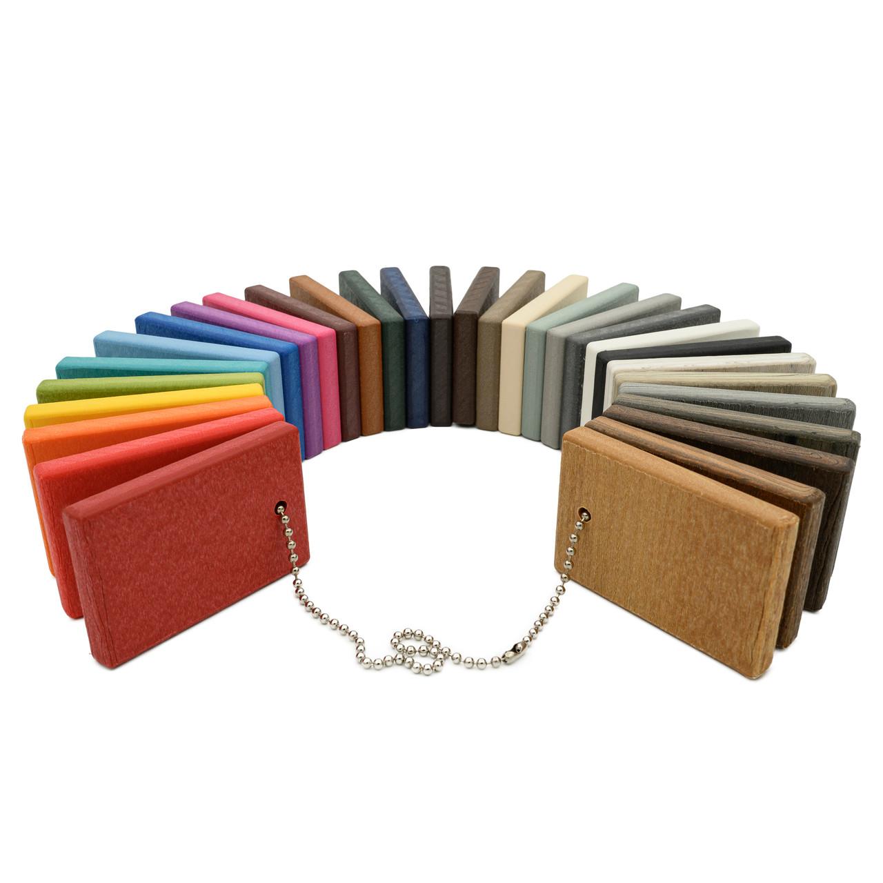 Collection of poly samples in various colors with a chain on a white background